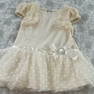 Nanette Baby Cream Dress with Rosette Sleeves